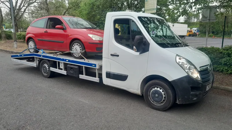 Recovery truck collecting a car bought for scrap in Carlisle